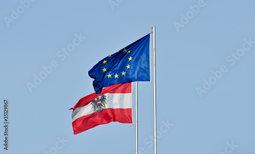flags of austria and the european union against blue sky