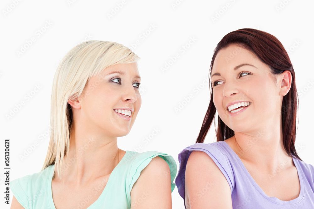 Laughing Friends standing back to back Laughing Friends standing back to back