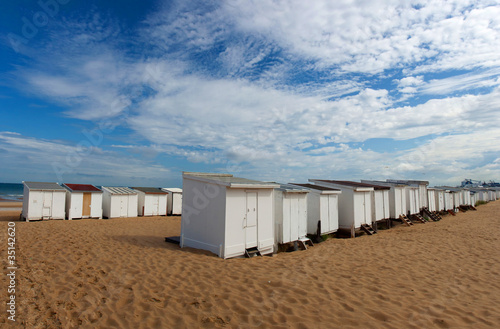 Canvastavla Small beach house on sand beach in Calais, France