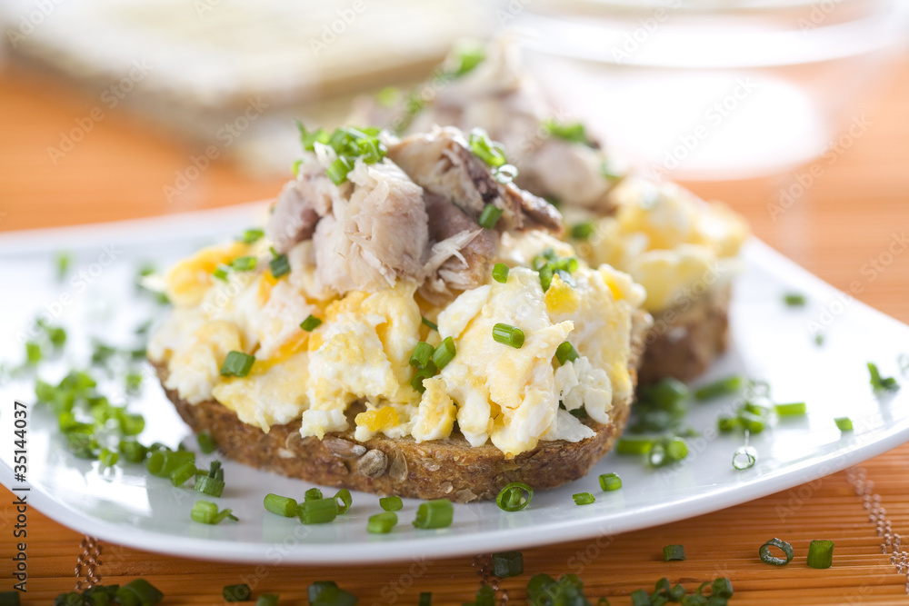 Sandwich with scrambled eggs and mackerel Sandwich with scrambled eggs and mackerel