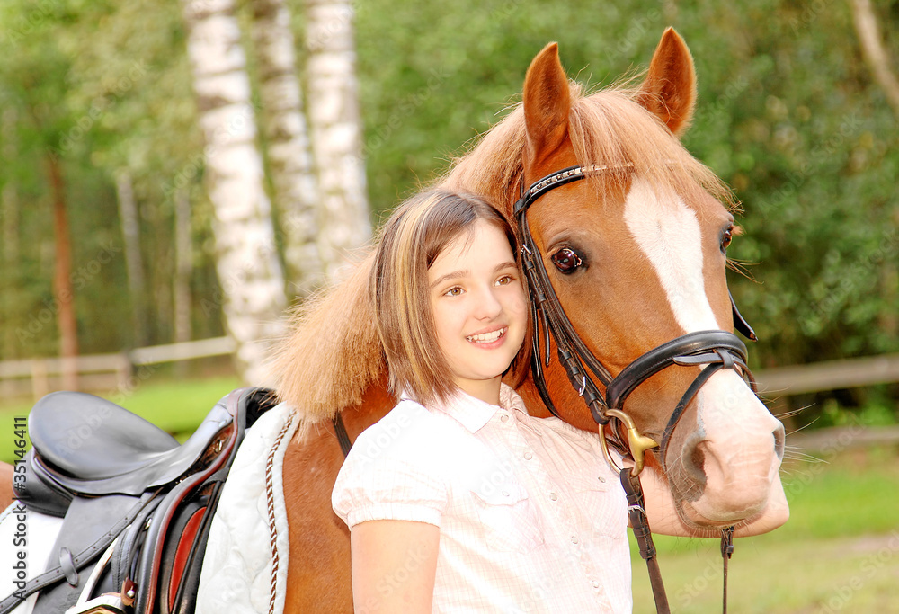 Obraz premium Mädchen und ihr Pony