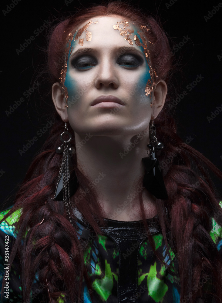 Close-up portrait of beautiful redhair woman with futuristic mak Close-up portrait of beautiful redhair woman with futuristic mak