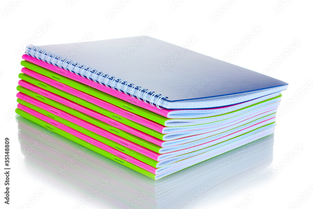 Green and pink notebooks isolated on white Green and pink notebooks isolated on white