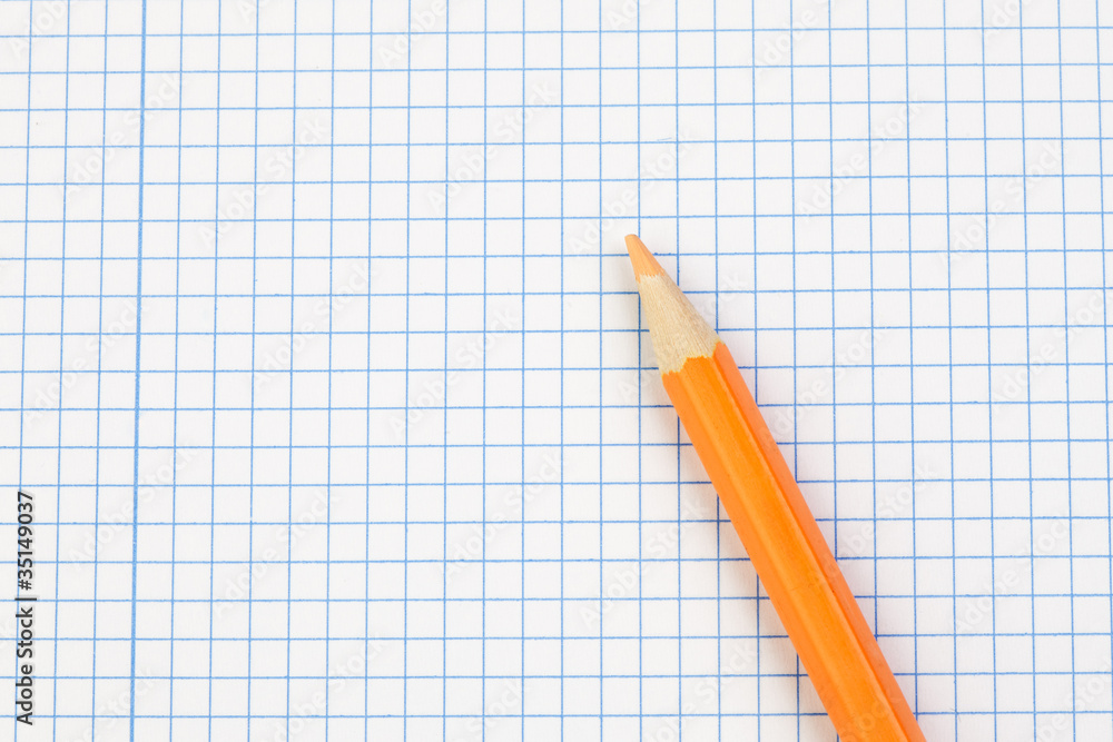Sharp pencil on a notebook Sharp pencil on a notebook