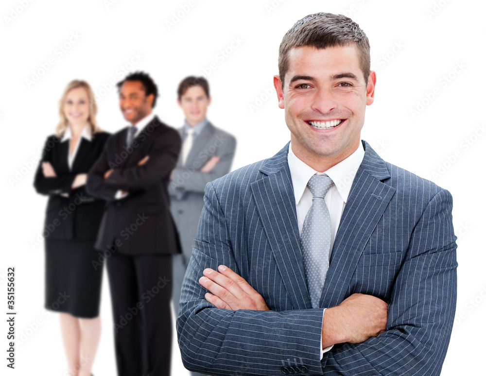 Businessman in front of colleagues Businessman in front of colleagues