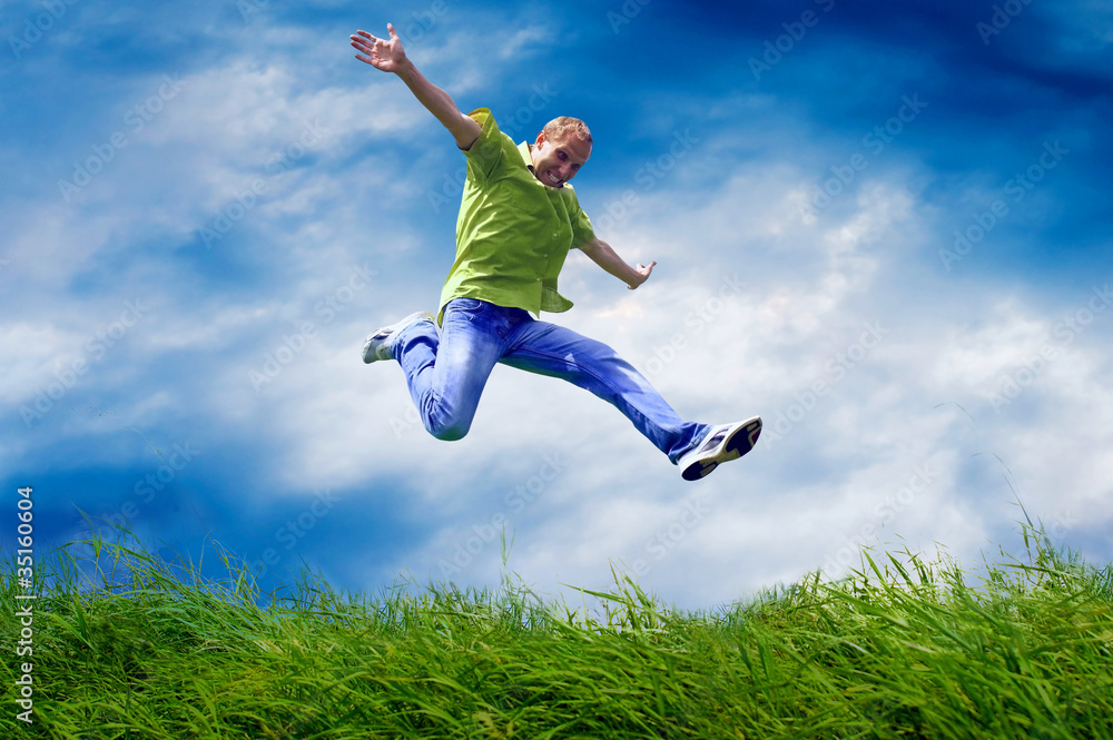 Fun man in jump on the outdoor background Fun man in jump on the outdoor background