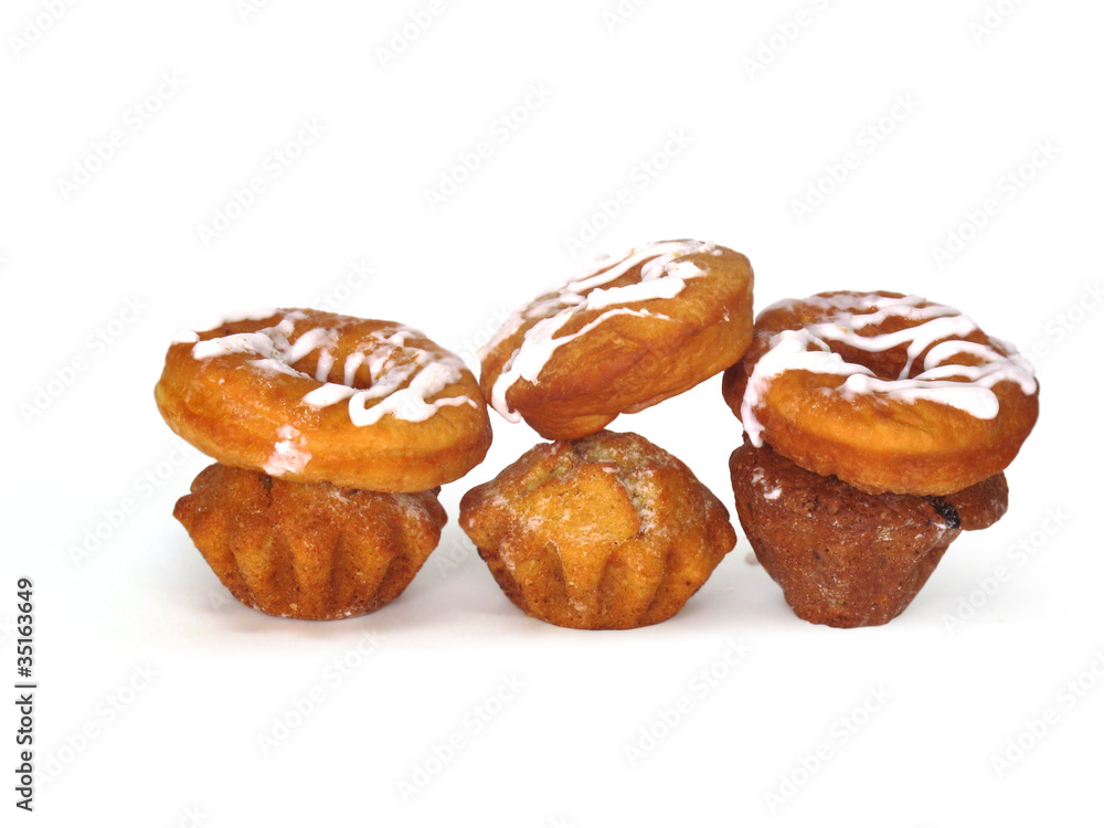 Donuts and rolls lie in wattled in a basket Donuts and rolls lie in wattled in a basket