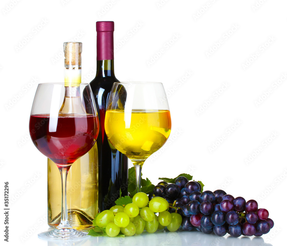 Fototapeta premium Ripe grapes, wine glasses and bottles of wine isolated on white