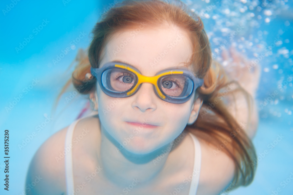 children girl funny underwater with goggles children girl funny underwater with goggles