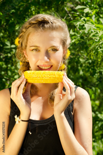 woman eating corn-cob