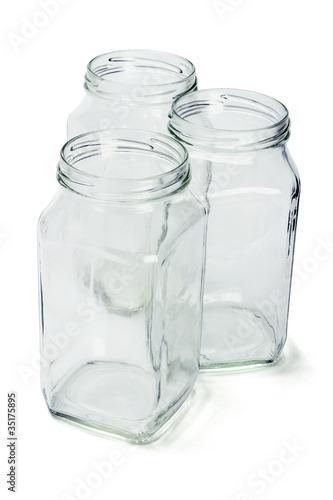 Three empty glass containers