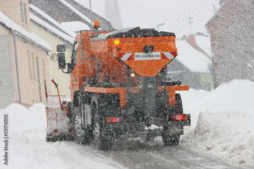 Winter service vehicle in use in heavy snow-fall