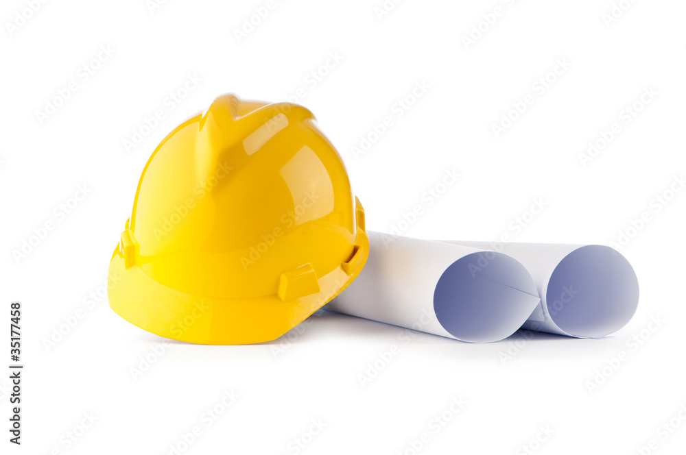 Hard hat and drawings isolated on white Hard hat and drawings isolated on white
