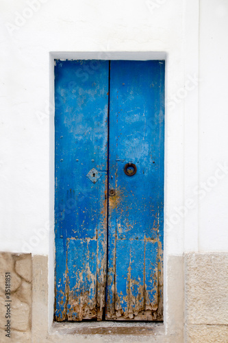 Blue wood door Mediterranean architecture Ibiza © lunamarina