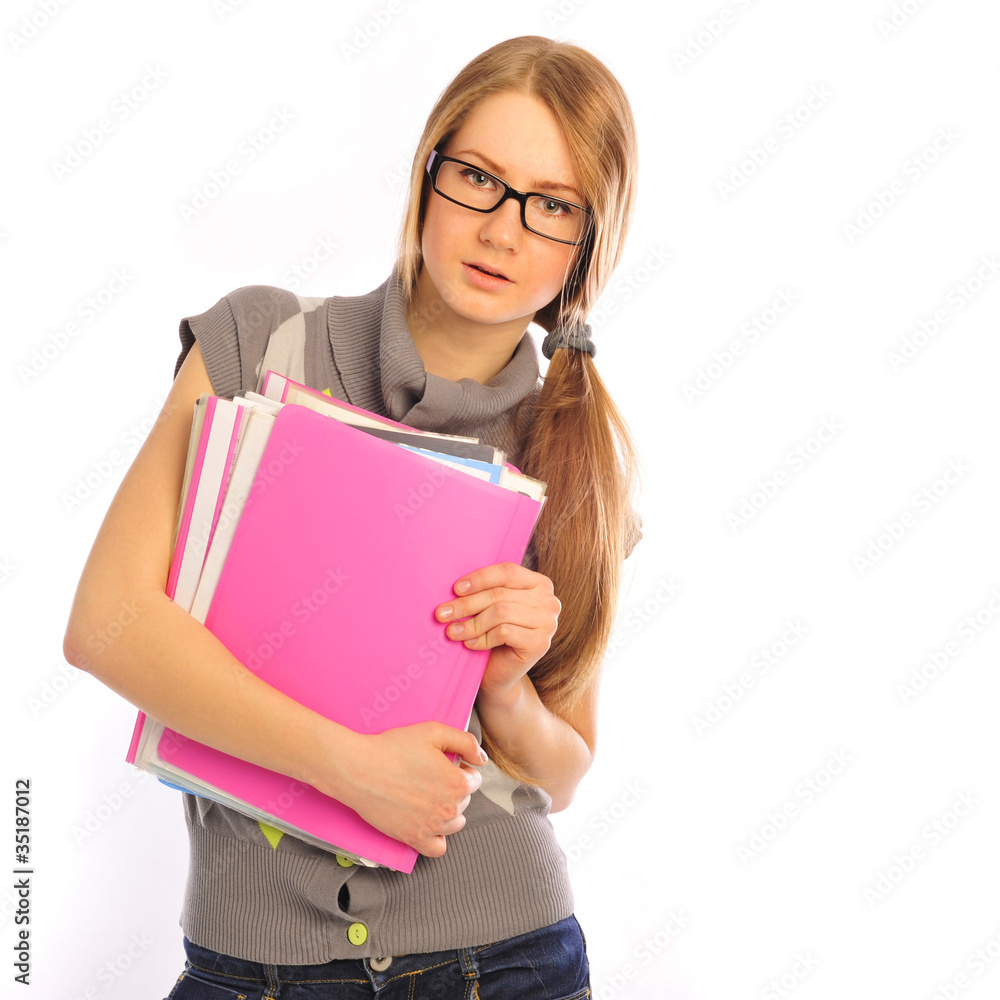 Young smiling student woman with books. Over white background Young smiling student woman with books. Over white background