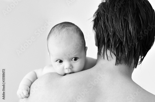 baby on father's shoulder