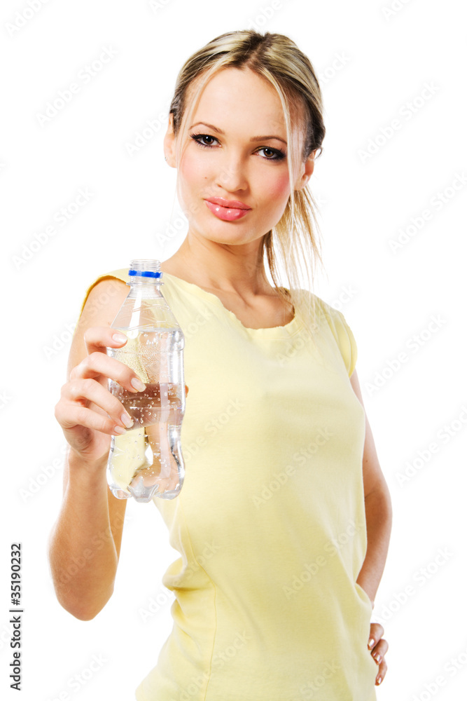 Cheerful beautiful woman with a bottle of fresh water Cheerful beautiful woman with a bottle of fresh water