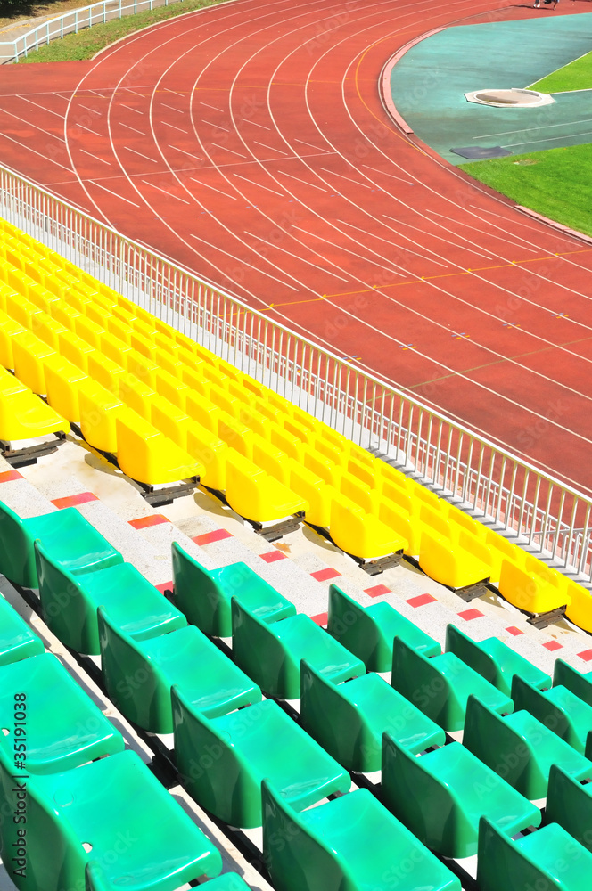 Fototapeta premium rows of plastic chairs at the stadium