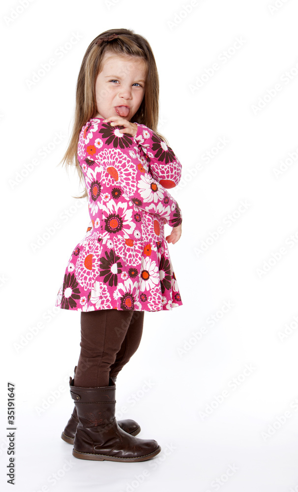 Young girl sticking tongue out