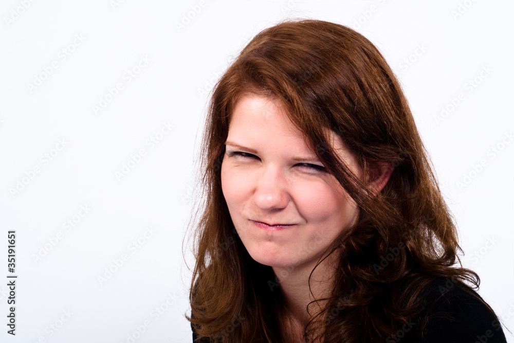 Young brunette woman looking annoyed Young brunette woman looking annoyed