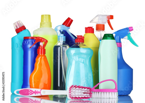 detergent bottles and brushes isolated on white