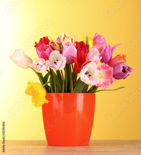 Fototapeta Naklejka Na Ścianę i Meble -  Tulips in vase isolated on white