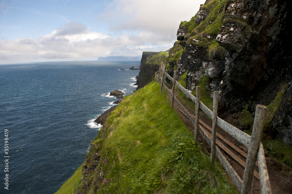 Scenic view of coast of Mykines, Faroe Islands