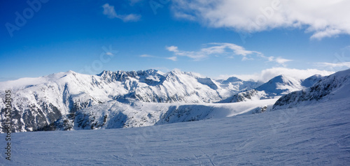 Photography Panorama of winter mountains in Bansko, Bulgaria