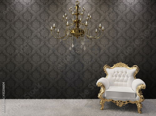 Royal interior. Golden chandelier with luxurious armchairs on bl