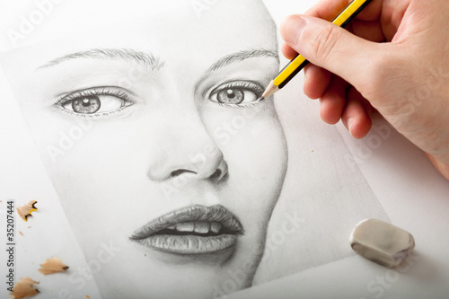 Hand Drawing a Woman Face