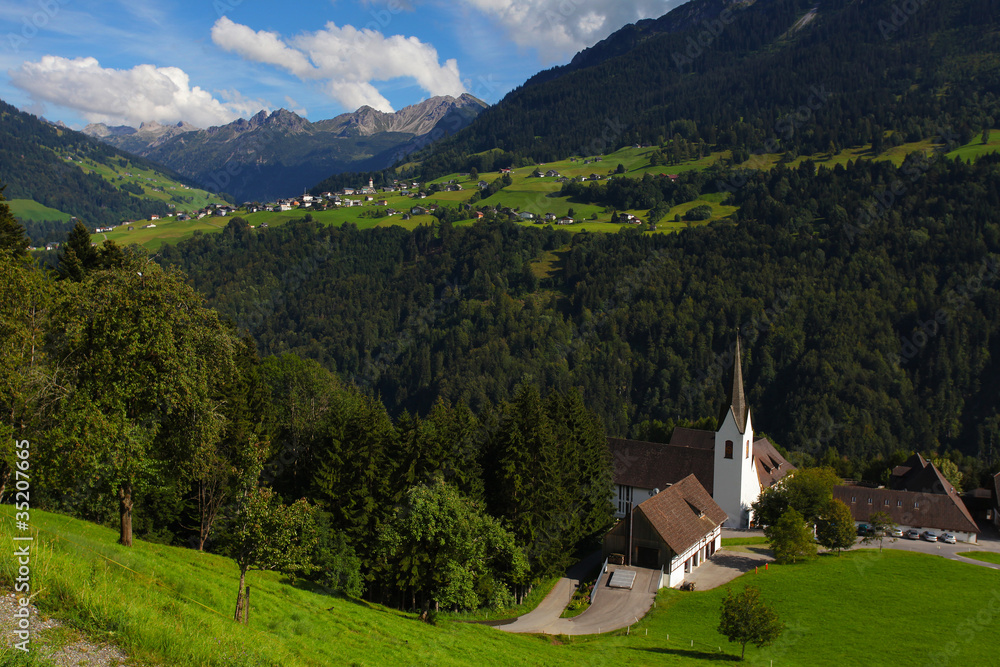 Typical view of the Alps with church in the foreground, Austria