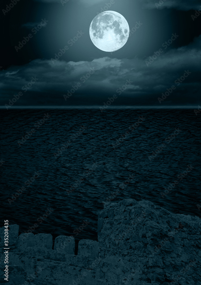 Fototapeta premium full moon in clouds reflected in water
