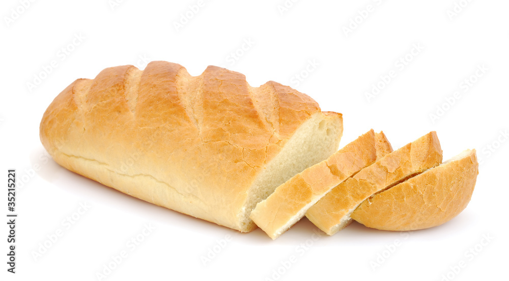 Loaf of bread with slices isolated on white background Loaf of bread with slices isolated on white background