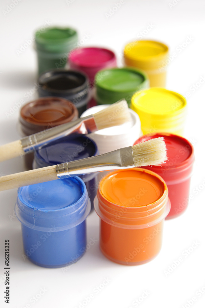 gouache of paint and brush on white background gouache of paint and brush on white background