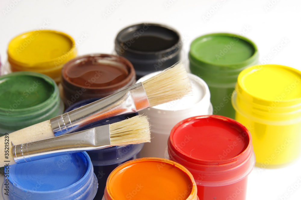 gouache of paint and brush on white background gouache of paint and brush on white background
