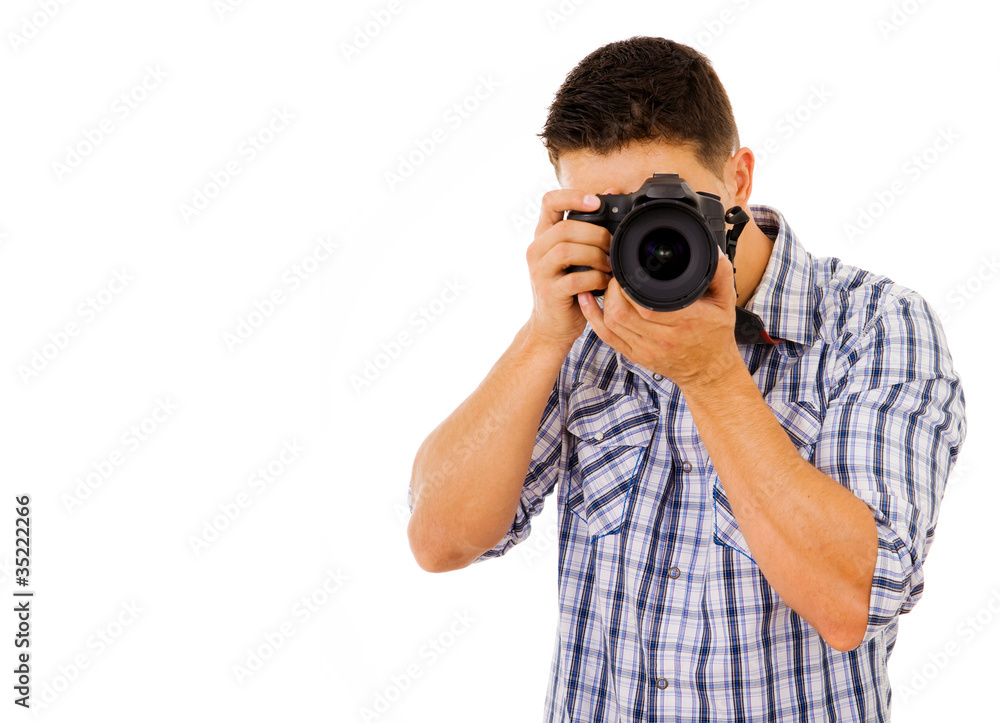 Young photographer with camera, isolated on white Young photographer with camera, isolated on white