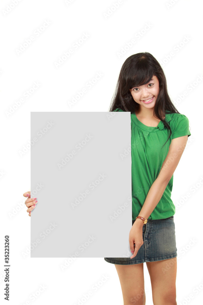 Beautiful woman holding empty white board Beautiful woman holding empty white board