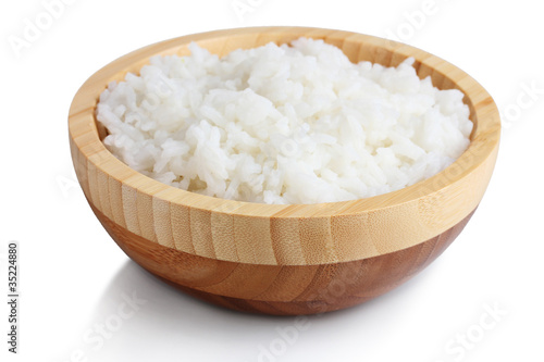 Wallpaper Mural Wooden bowl of cooked rice  isolated on white Torontodigital.ca