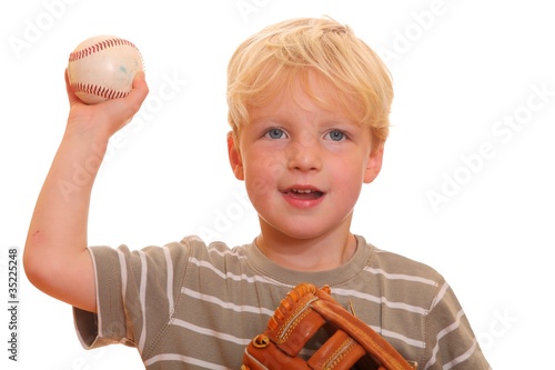 Young boy with a baseball