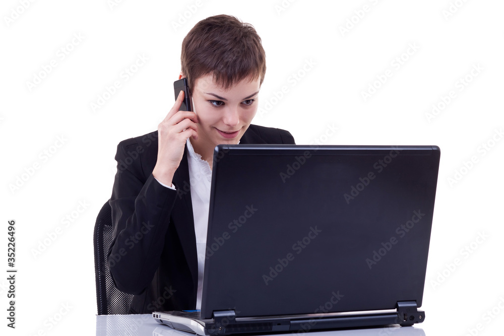 business girl using cell phone while working business girl using cell phone while working