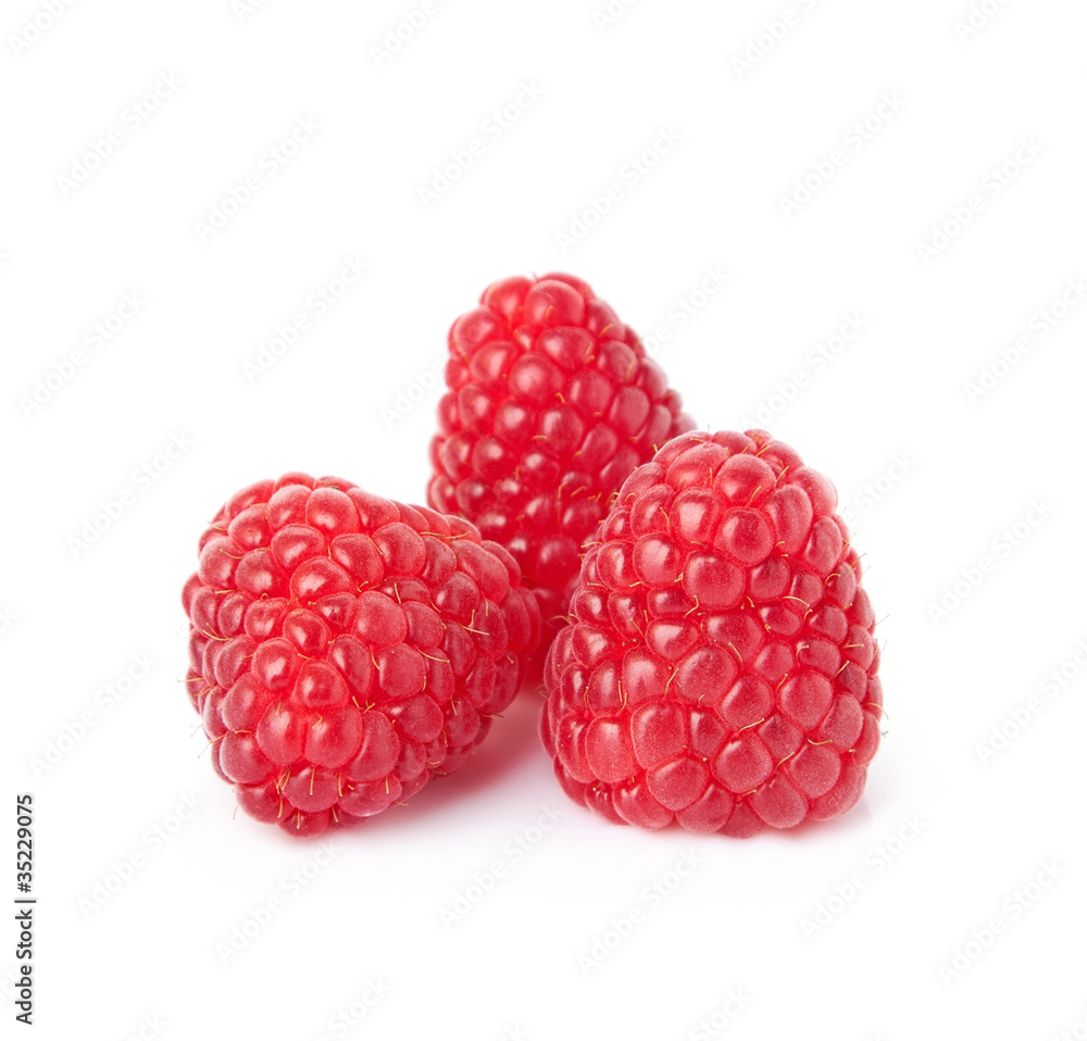 three sweet raspberry over white background. three sweet raspberry over white background.