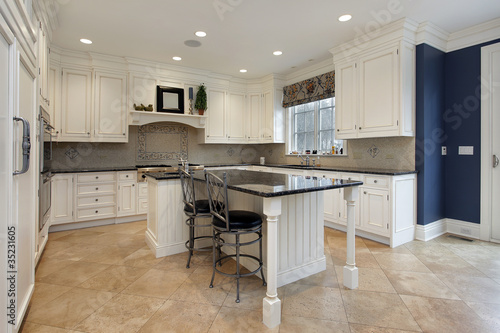 Upscale kitchen with granite island