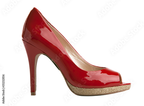 Red female shoe with open toe isolated over white