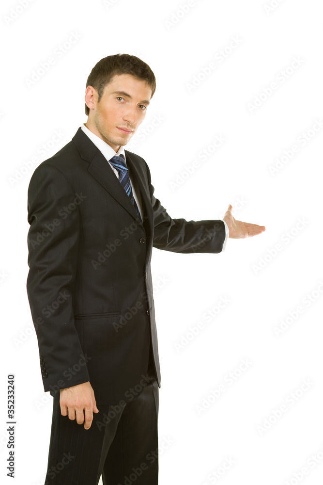 Businessman with arm out in a welcoming gesture Businessman with arm out in a welcoming gesture