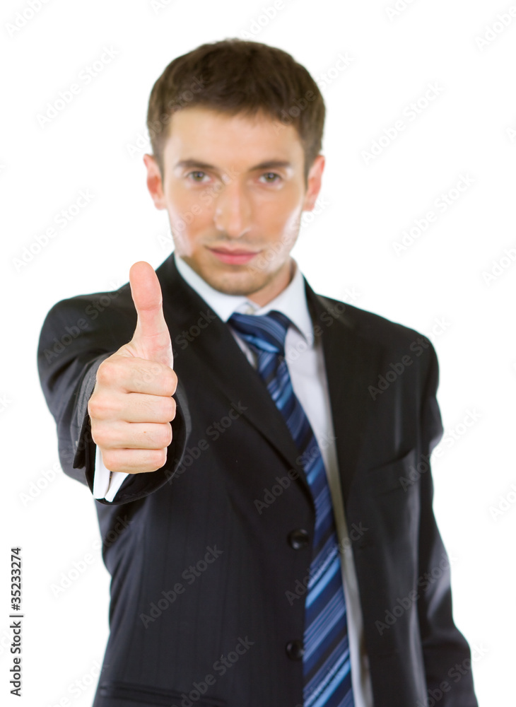 Portrait of a excited business man showing a success sign Portrait of a excited business man showing a success sign