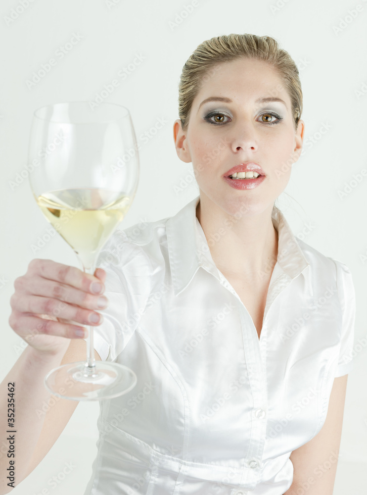 portrait of young woman with a glass of white wine portrait of young woman with a glass of white wine