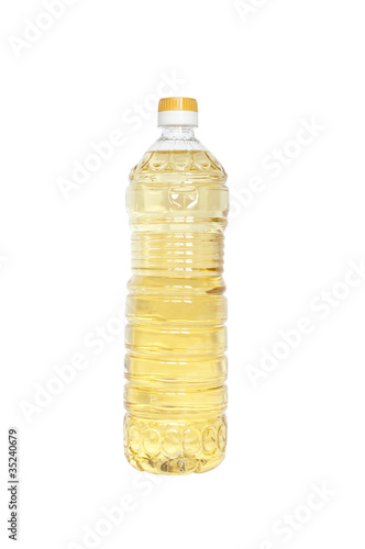 Close up of cooking oil bottle on white background