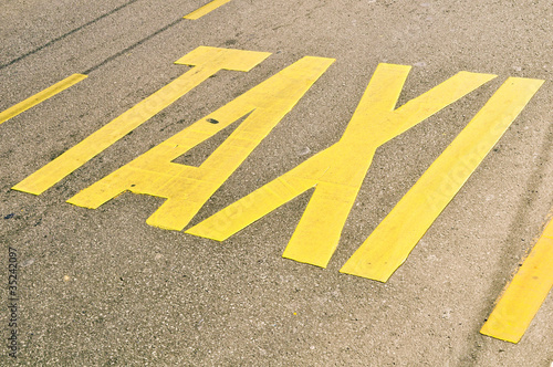 Taxi stand sign painted on the street