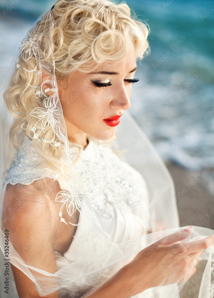 portrait of the young beautiful blonde with brightly red lips portrait of the young beautiful blonde with brightly red lips