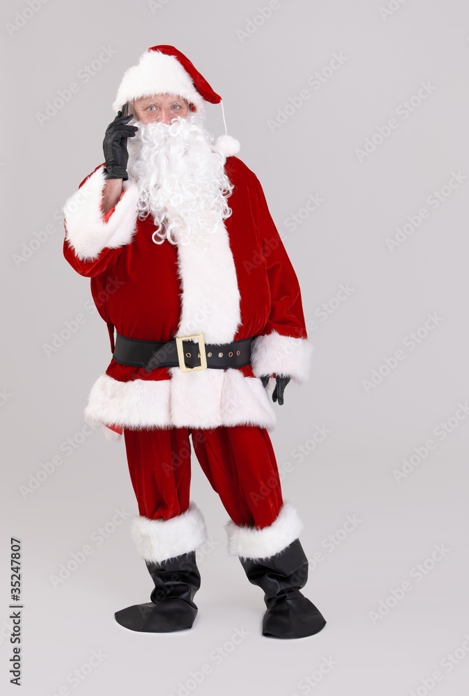 Santa talking on mobile phone Santa talking on mobile phone